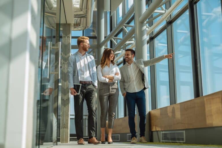 Business owners looking at real estate with a professional