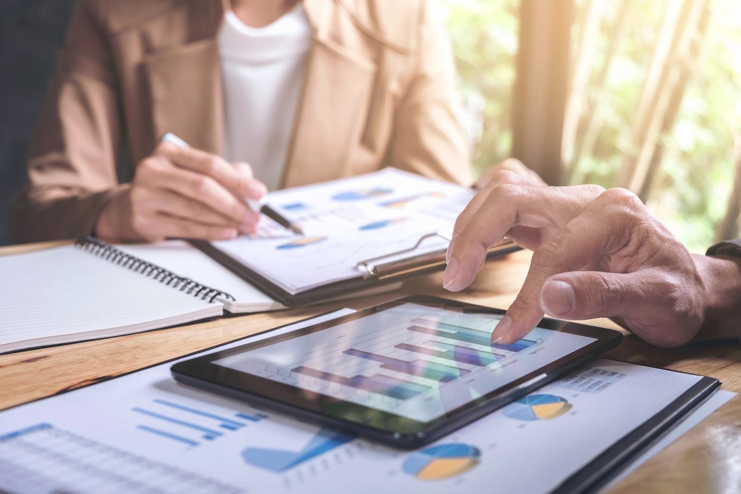 Business owners reviewing finances