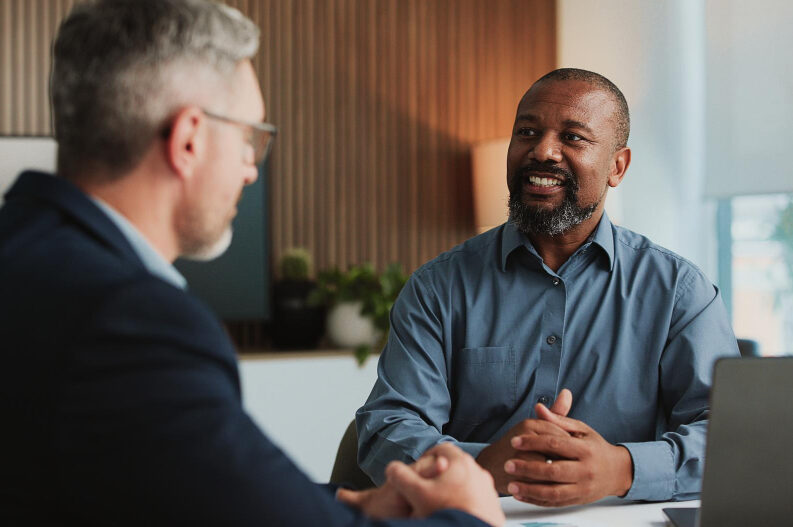 CPA advisor meeting with a client to discuss financial guidance and trust